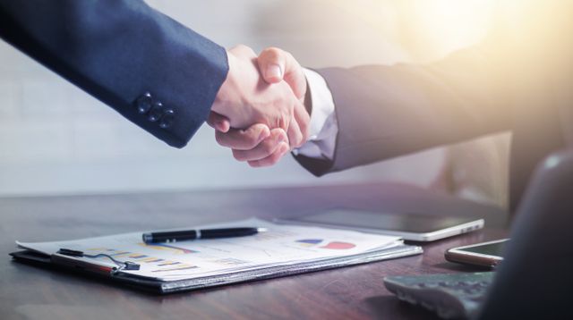 people shaking hands